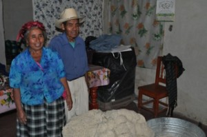 Weaver Paulina Chávez Gutiérrez with her new wool through Investours in Teotitlan, Oaxaca, Mexico