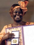 Wangari Maathai, founder of the Greenbelt Movement, with her Nobel Peace Prize