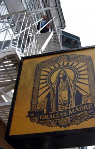 Sign at Gracias Madre organic Mexican restaurant in the Mission District, San Francisco, USA