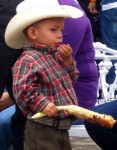 Boy eating corn, Expo Membrillo 2010 - Atotonilquillo, Jalisco, Mexico Boy eating corn, Expo Membrillo 2010, in Atotonilquillo, Jalisco, Mexico