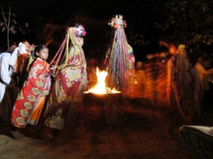 Nighttime cultural dance at Banjaar Tola Tented Camp in Kanha National Park, India