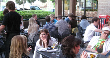 Crowded dining patio, Waterfront Restaurant & Wine Bar - Kelowna, British Columbia, Canada Crowded dining patio, Waterfront Restaurant & Wine Bar in Kelowna, British Columbia, Canada