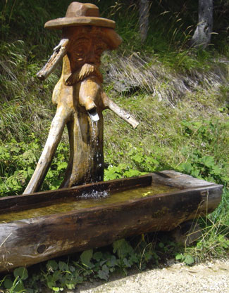 Roadside mountain spring in Slovenia